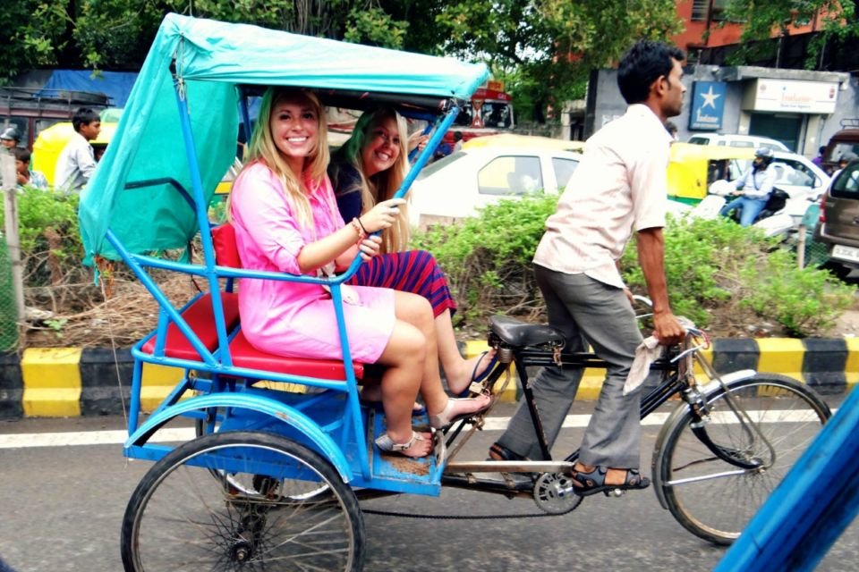tourist on rikshaw in agra photo
