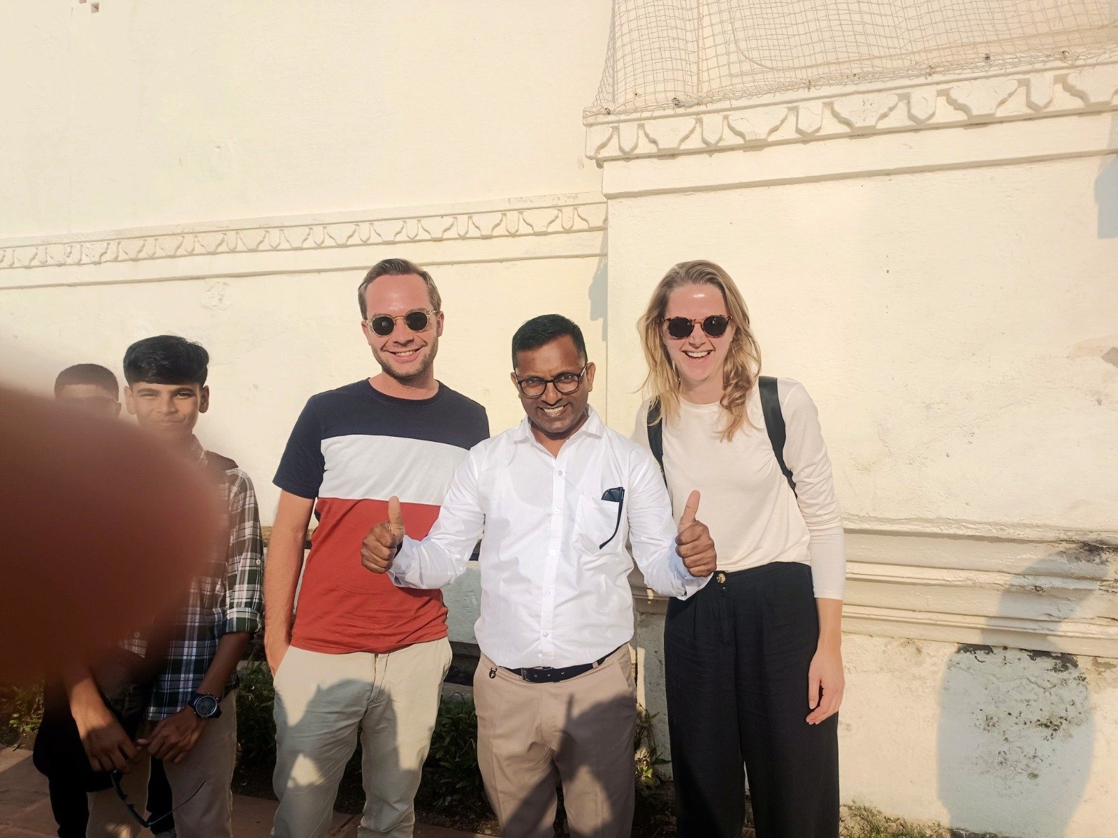 Foreign traveler at Taj Mahal with expert guide