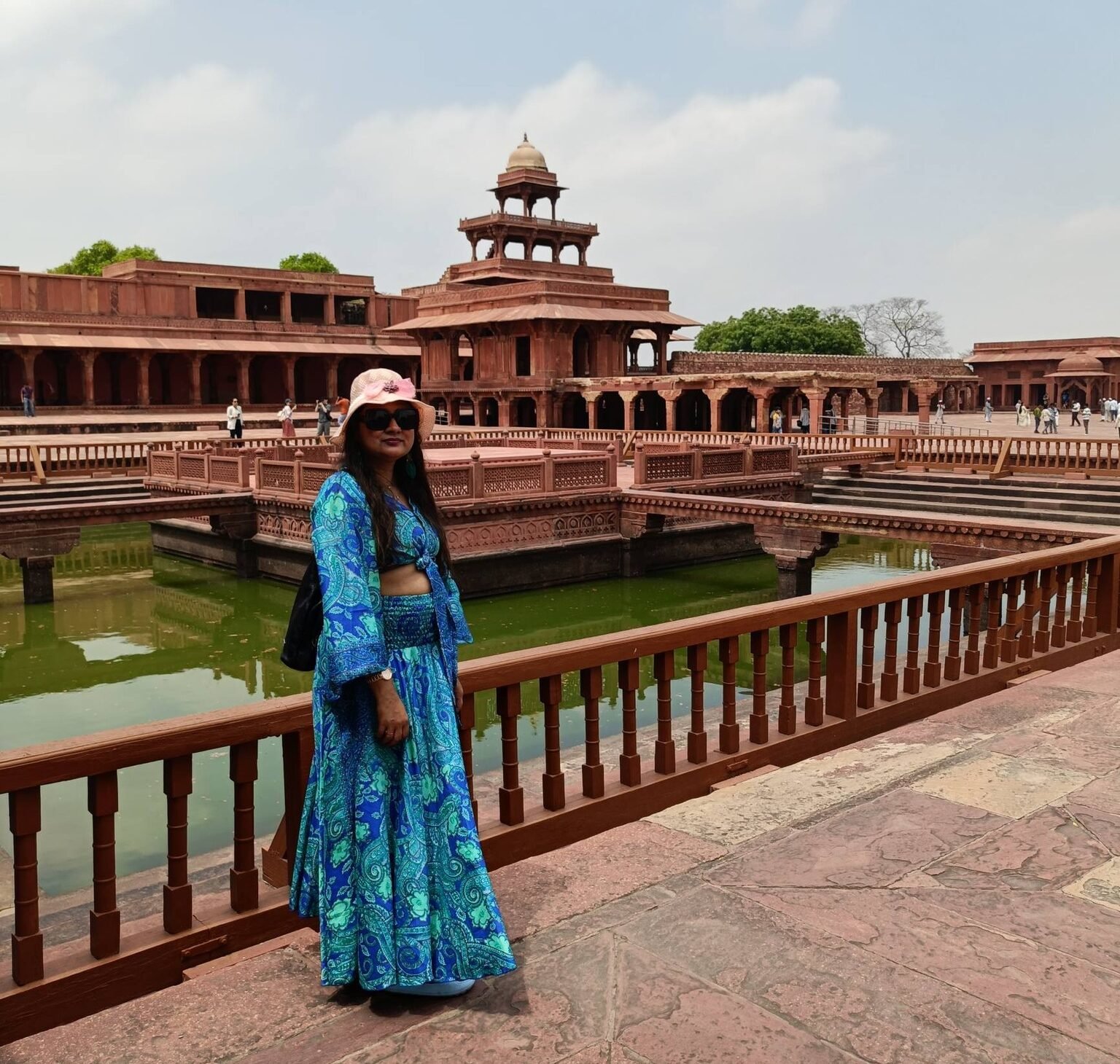 Travelers exploring Fatehpur Sikri Fort complex