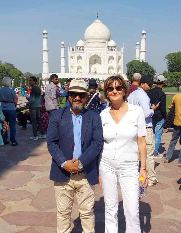 Solo traveler with local government approved guide exploring Taj Mahal during Delhi to Taj Mahal day trip with cost breakdown tour experience
