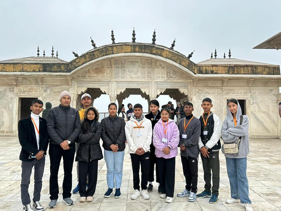 Group of tourists exploring Agra Fort during a two-day stay in Agra