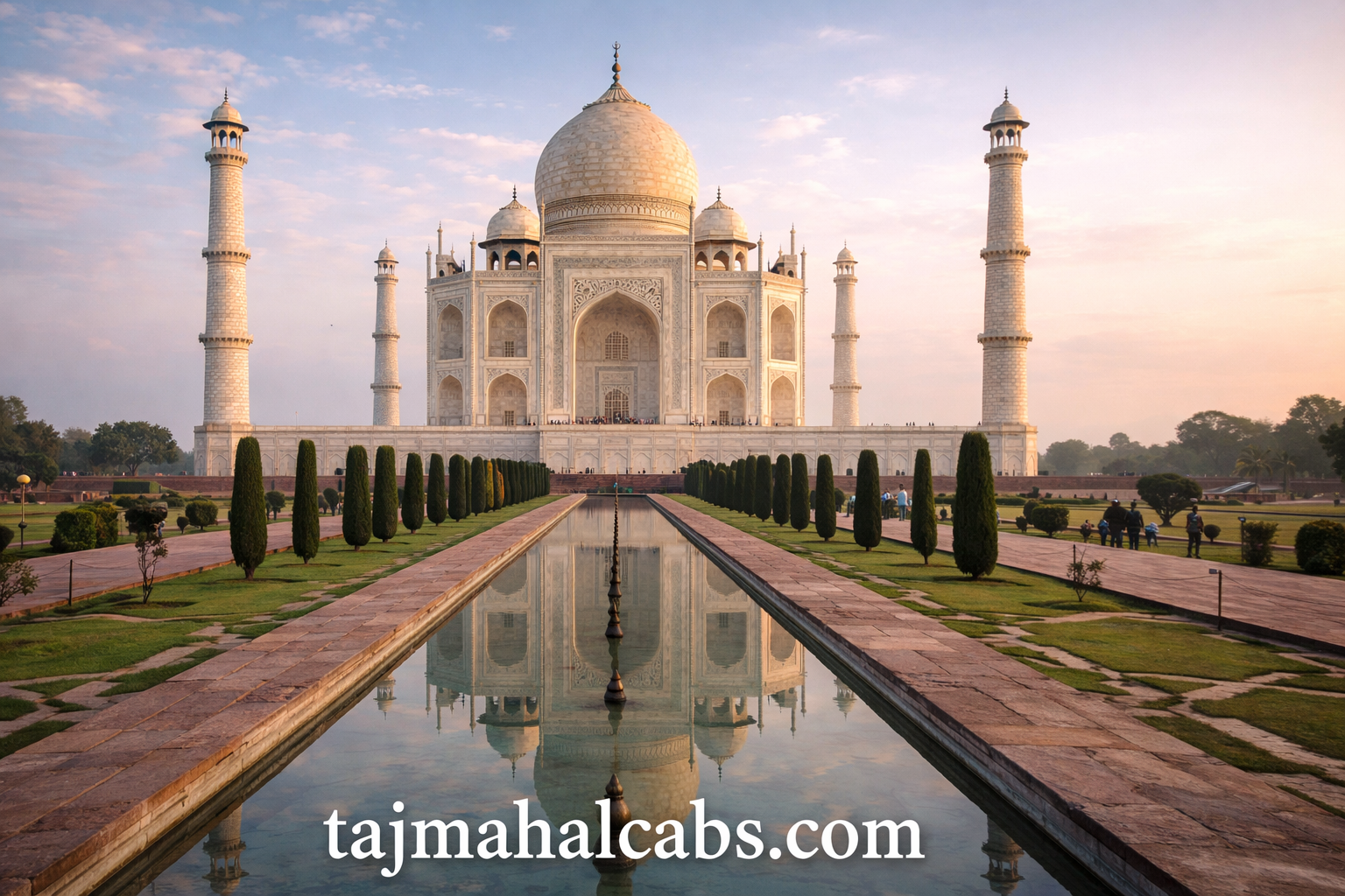 Taj Mahal reflection in water at sunrise with clear sky and soft golden light